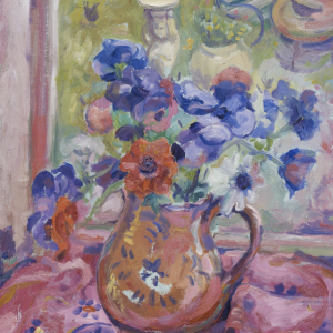 Flowers in a jug on a windowsill. Behind are birds in the garden.