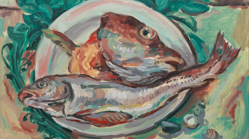 The head of a fish and another gutted on a plate.